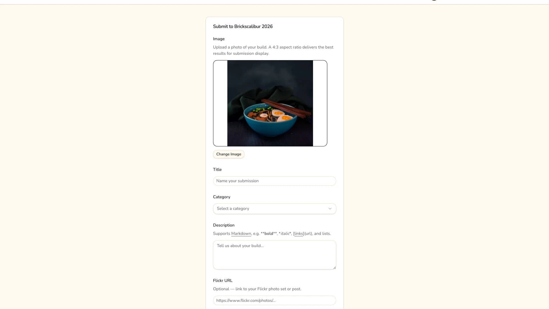 The submission form with a photo selected and previewed above a Change Image button